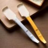 Silicone jam scraper, non-stick icing scraper, and multipurpose kitchen tool for baking and cleaning.