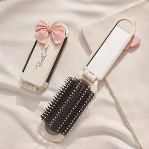 Portable folding comb with air cushion, detachable ivory anti-static mirror, ABS plastic handle, suitable for all hair types.