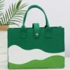 vChic colorblock felt tote bag for women with large capacity, secure closure, and wrist strap.