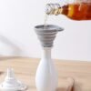 1pc collapsible silicone funnel, designed for easy storage and kitchen use, perfect for transferring liquids and powders.