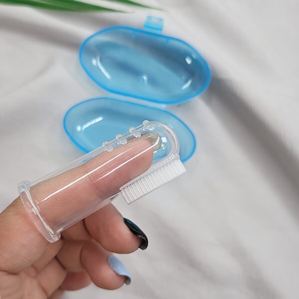 Soft silicone dog finger toothbrush for gentle dental care, made from recyclable plastic, no batteries required.