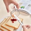Silicone jam scraper, non-stick icing scraper, and multipurpose kitchen tool for baking and cleaning.