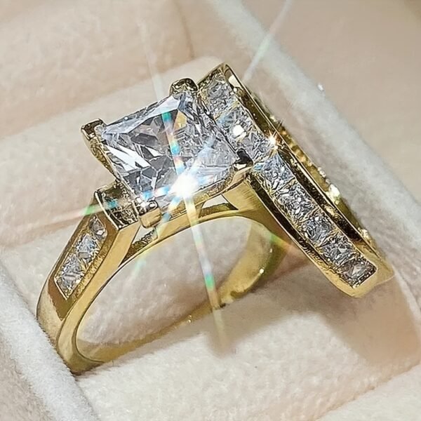 Stylish men's and women's couple jewelry set featuring shiny square cubic zirconia wedding rings, perfect for engagement, anniversaries, or special occasions.
