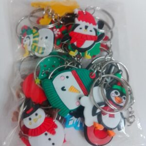 20pcs Christmas-themed keychains featuring Santa, snowman, reindeer, and tree designs made of cute silicone PVC charms.