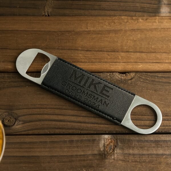 Custom metal beverage opener with personalized name engraving.