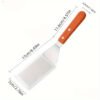 Premium stainless steel spatula set with wooden handles for cooking and flipping.