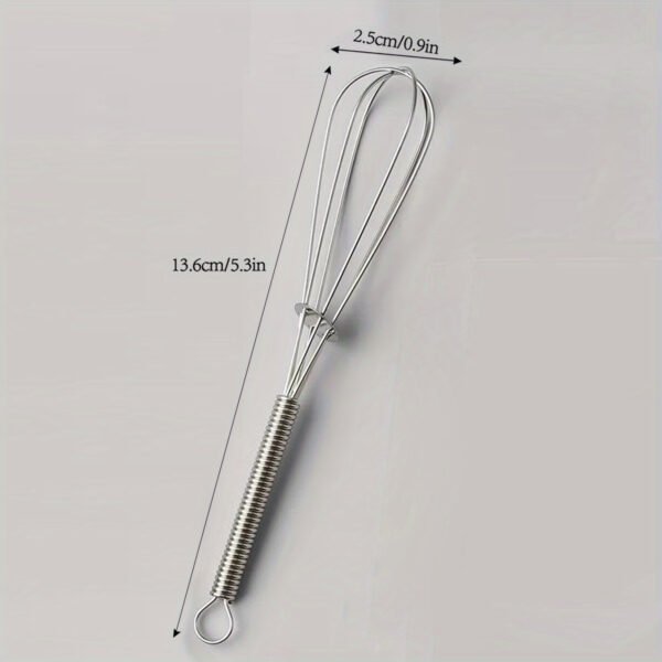 Stainless steel whisk for mixing, whipping, and beating eggs and batter.