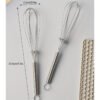 Stainless steel whisk for mixing, whipping, and beating eggs and batter.