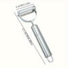 Stainless steel 2-in-1 peeler and shredder tool for peeling and shredding fruits, vegetables, and more.