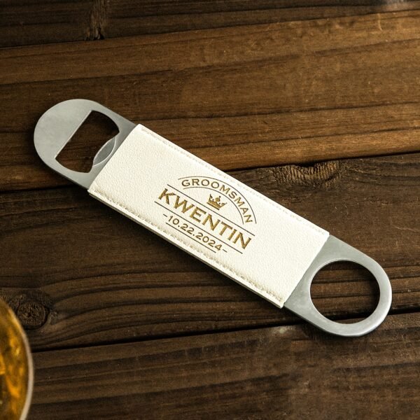 Custom metal beverage opener with personalized name engraving.