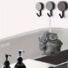 6pcs black self-adhesive wall hooks with strong adhesive for no-drill installation, perfect for kitchen, bathroom, and utility use.