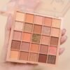 HOHOISYOU 25-Color Eyeshadow Palette with matte and shimmer finishes, waterproof earth tones, versatile makeup for all occasions, perfect for a holiday gift.