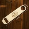 Custom metal beverage opener with personalized name engraving.