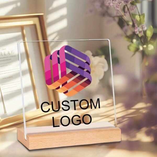 Customizable acrylic logo plaque with a wooden stand.