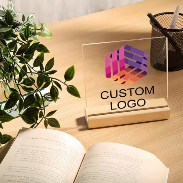 Customizable acrylic logo plaque with a wooden stand.