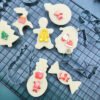 12-piece stainless steel Christmas cookie cutter set for festive baking.