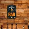 Personalized metal bar sign, ideal for wall hanging in a home pub.